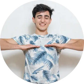 Breathing exercise A smiling male with both his palms facing downwards performing breathing exercise